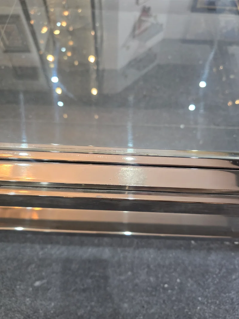 Table basse à plateau coulissant – Design 70 – Chrome & verre – 108 cm