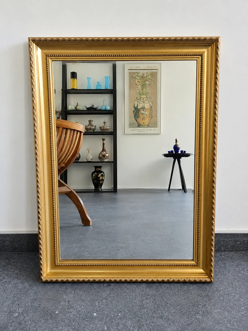 Miroir doré à glace biseautée – 70 × 52 cm