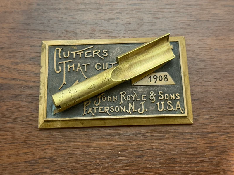Plaque en laiton “Cutters That Cut” - John Royle & Sons - 1908