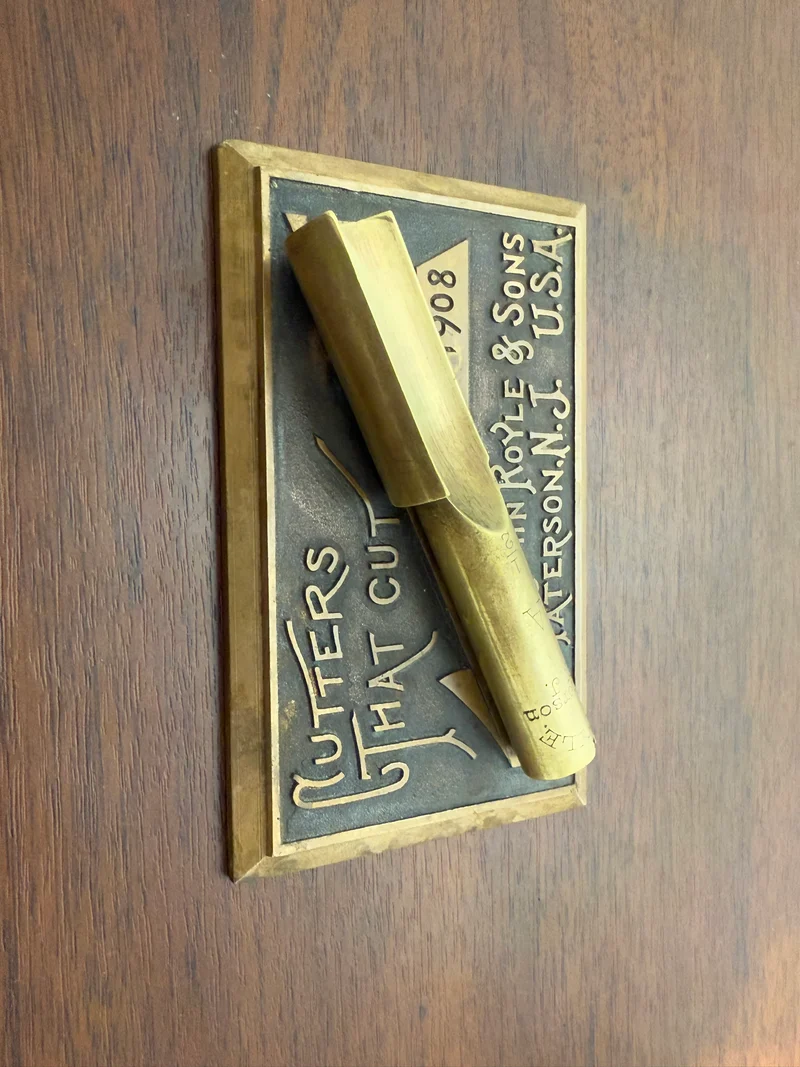 Plaque en laiton “Cutters That Cut” - John Royle & Sons - 1908