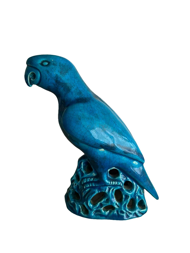 Perroquet ancien en céramique bleu