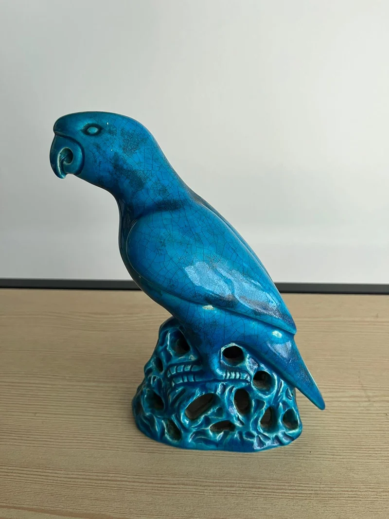 Perroquet ancien en céramique bleu