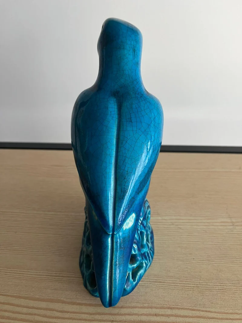 Perroquet ancien en céramique bleu
