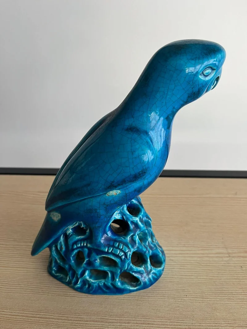 Perroquet ancien en céramique bleu