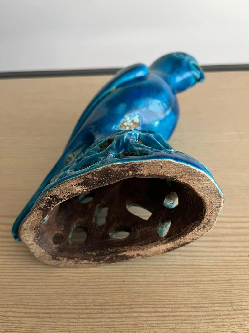 Perroquet ancien en céramique bleu