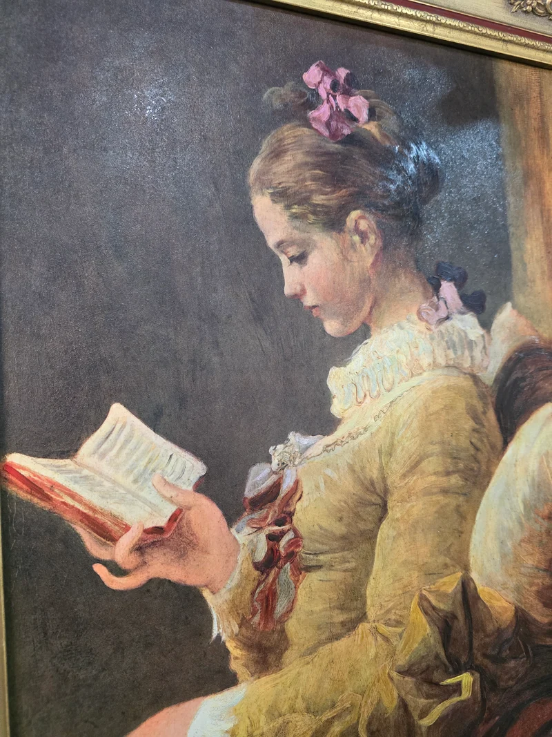 Tableau 'la Liseuse' cadre doré sculpté