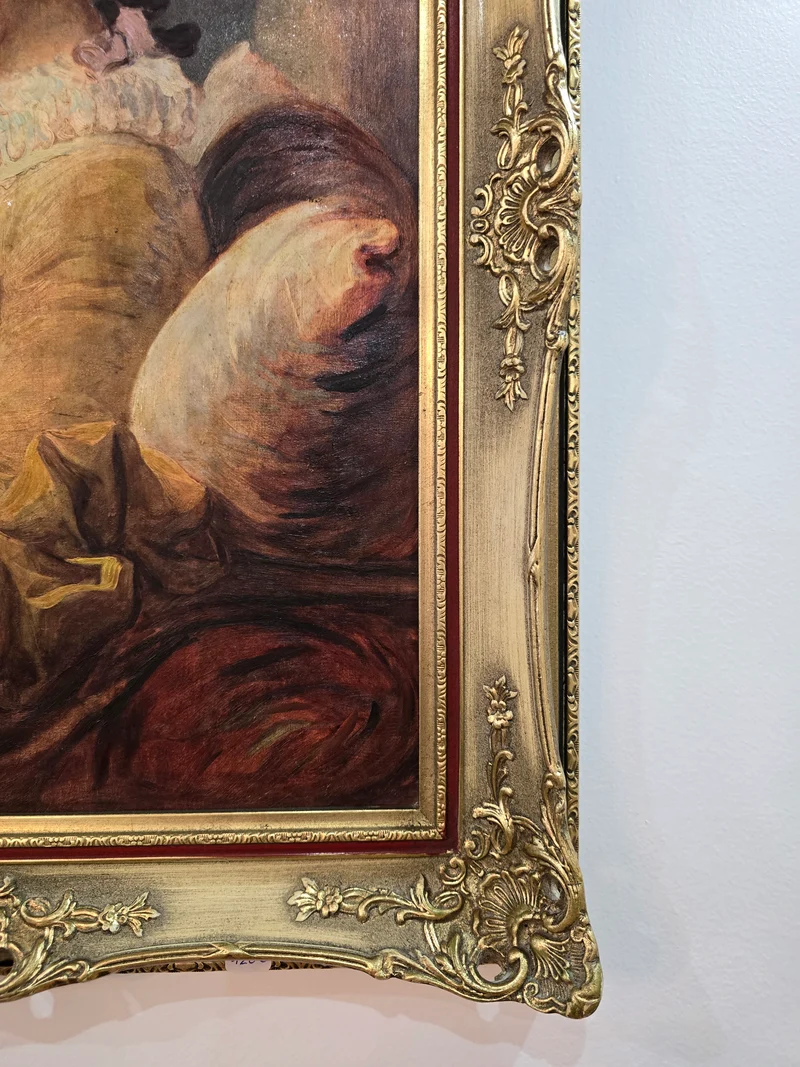 Tableau 'la Liseuse' cadre doré sculpté