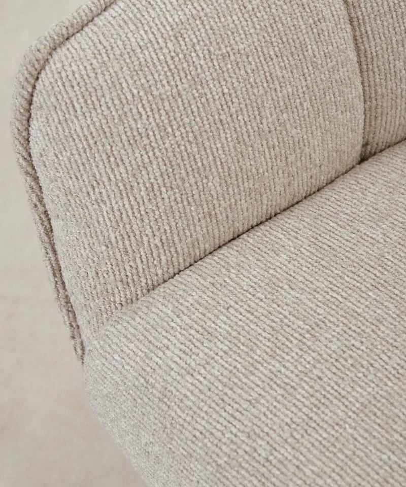 Sillón giratorio de tejido suave Alvar