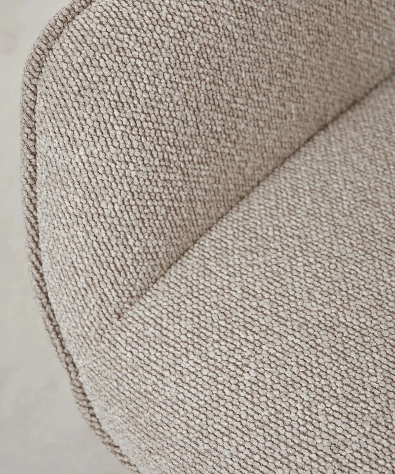 Sillón tapizado en tela bouclé Elsa