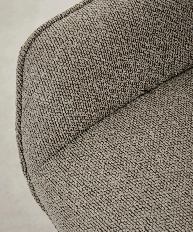 Sillón tapizado en tela bouclé Elsa