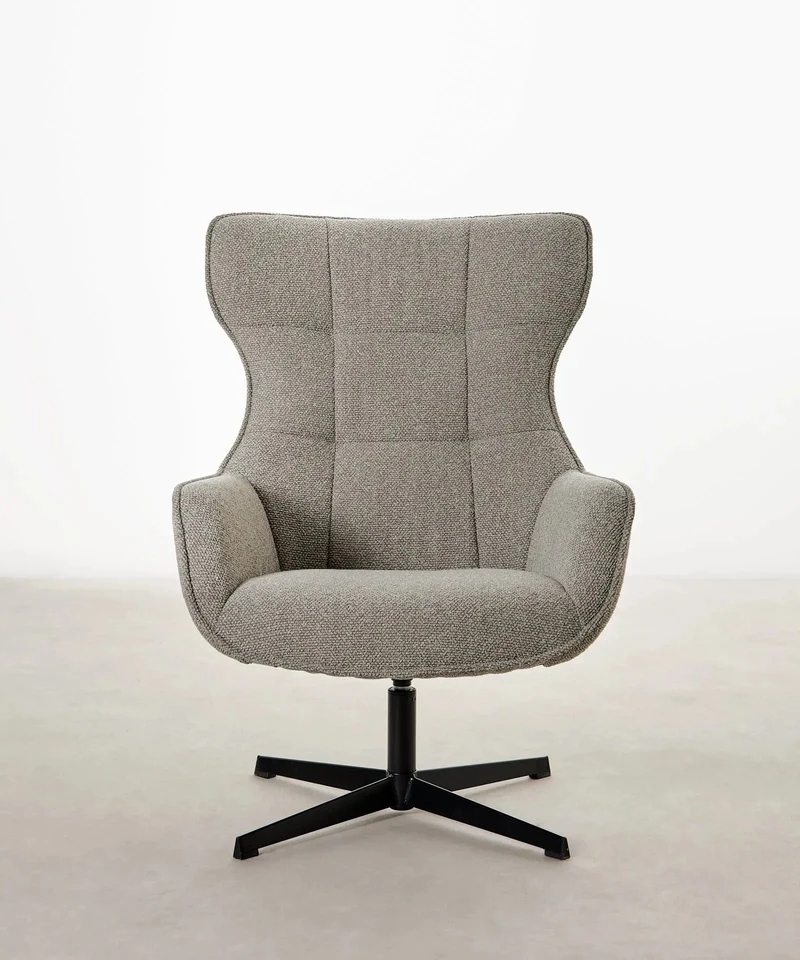Sillón tapizado en tela bouclé Elsa