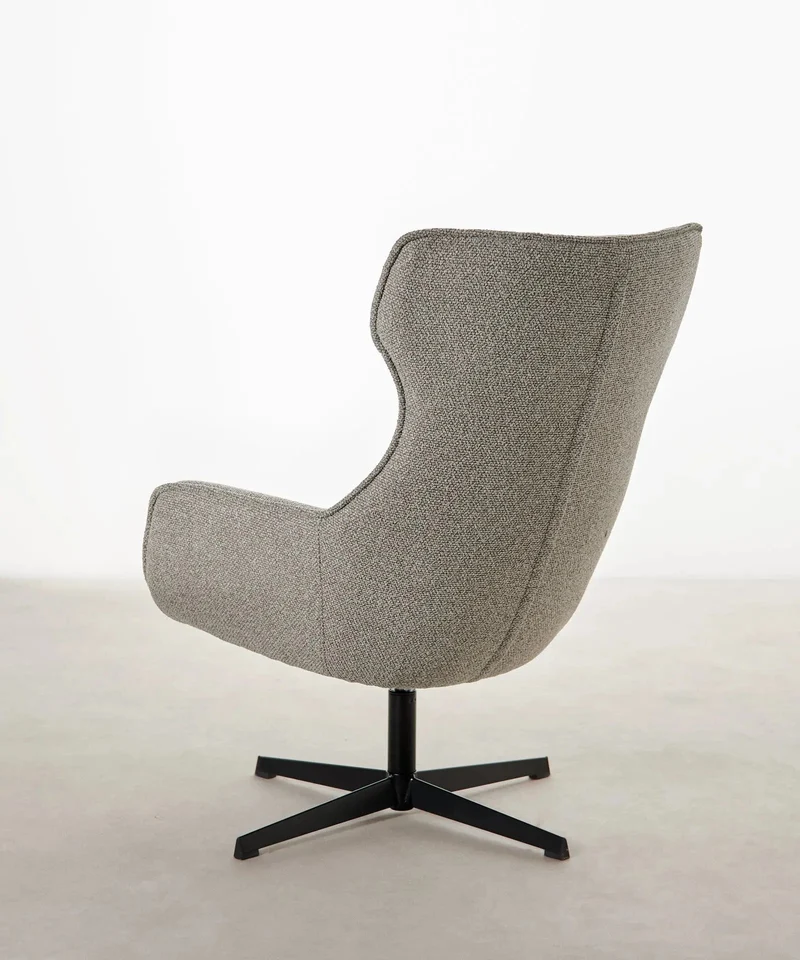 Sillón tapizado en tela bouclé Elsa