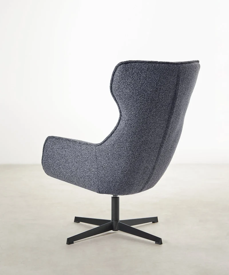 Sillón tapizado en tela bouclé Elsa