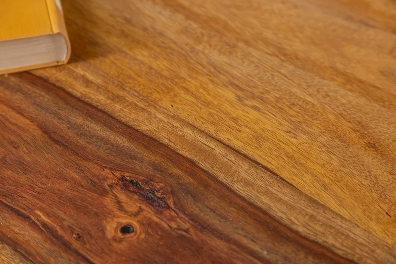 Table à manger ronde MAKASSAR 120cm bois massif de Sheesham marron finition pierre pieds épingles