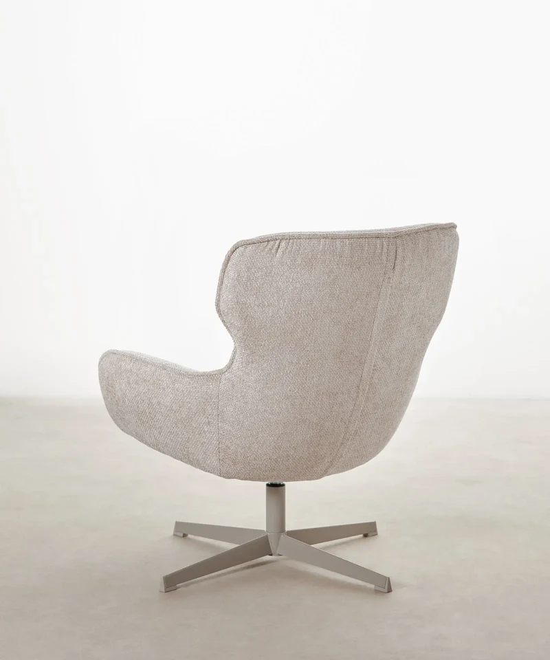Sillón giratorio en tejido suave Norden