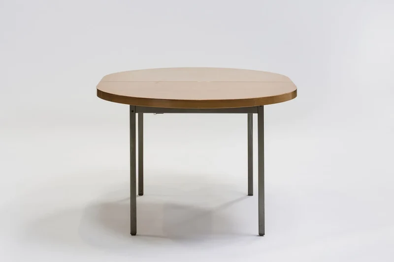 Mahogany dining table by Georges Frydman