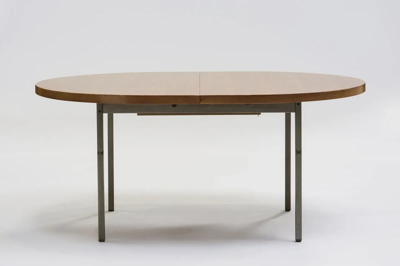 Mahogany dining table by Georges Frydman