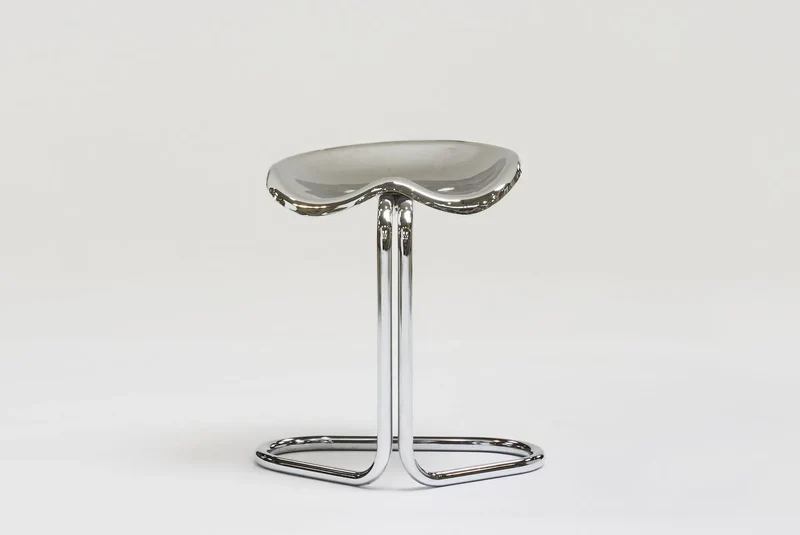 Metal stool by Rodney Kinsman