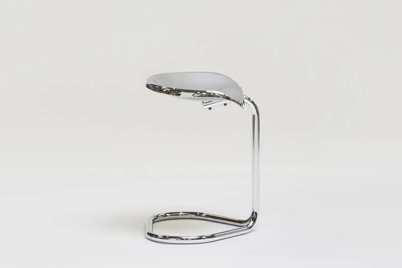 Metal stool by Rodney Kinsman