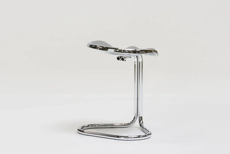 Metal stool by Rodney Kinsman