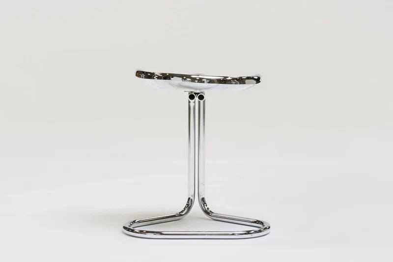 Metal stool by Rodney Kinsman
