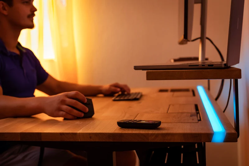 Walnut standing desk with epoxy LED light and cable management unit