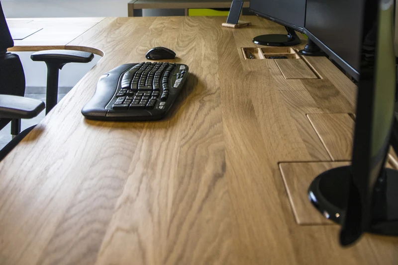 Wooden L shaped desk with extended cable management unit